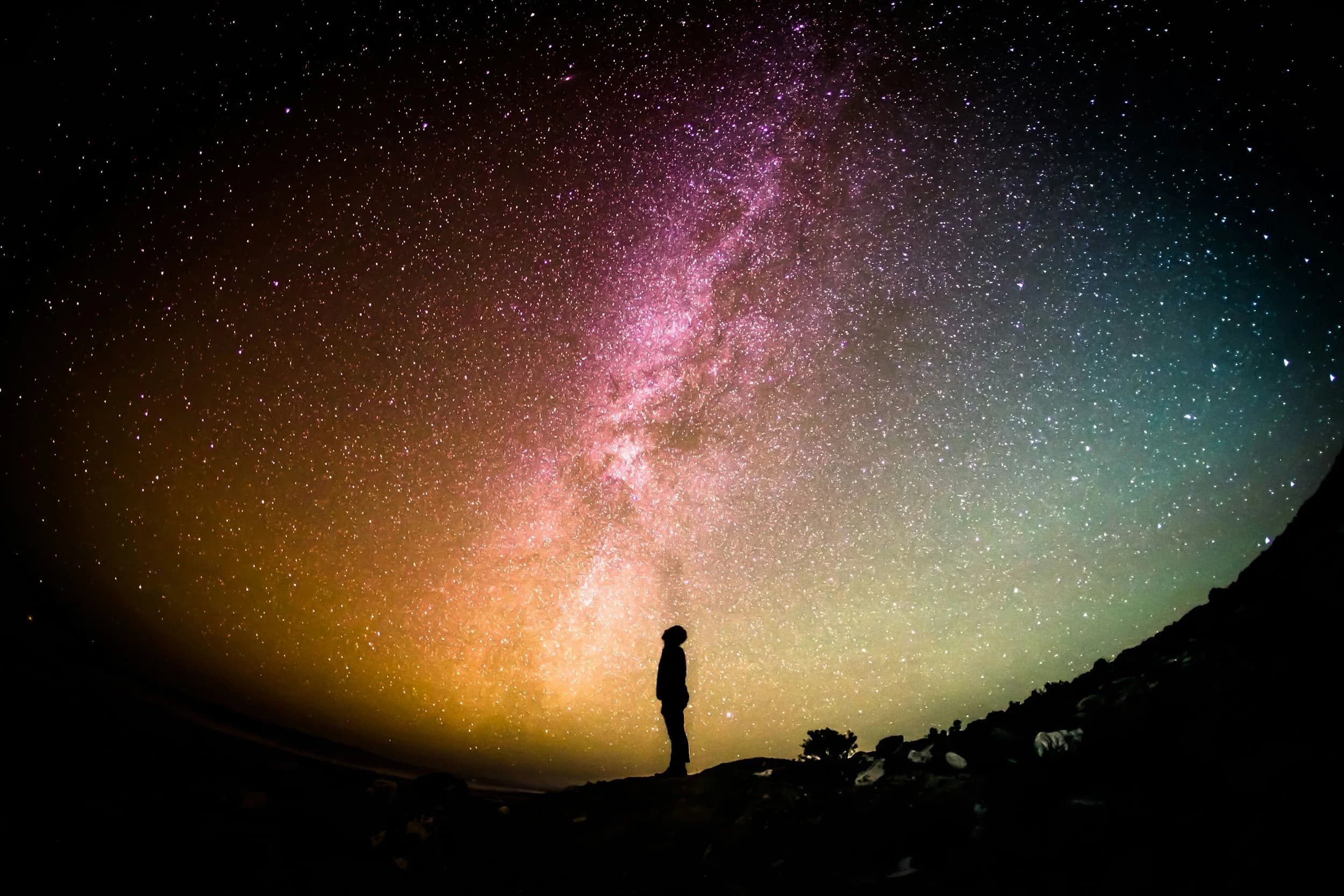 Planetary Solutions, PLLC homepage hero showing a silhouette under the Milky Way
